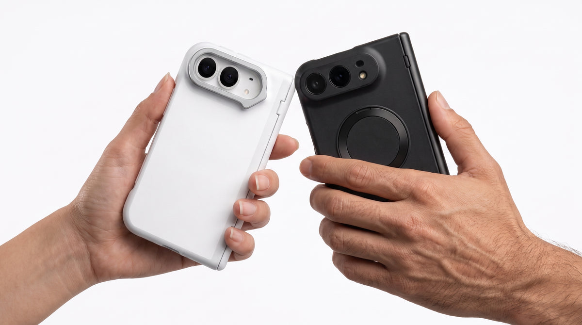 White iPhone case and black Galaxy Z Flip case held facing each other